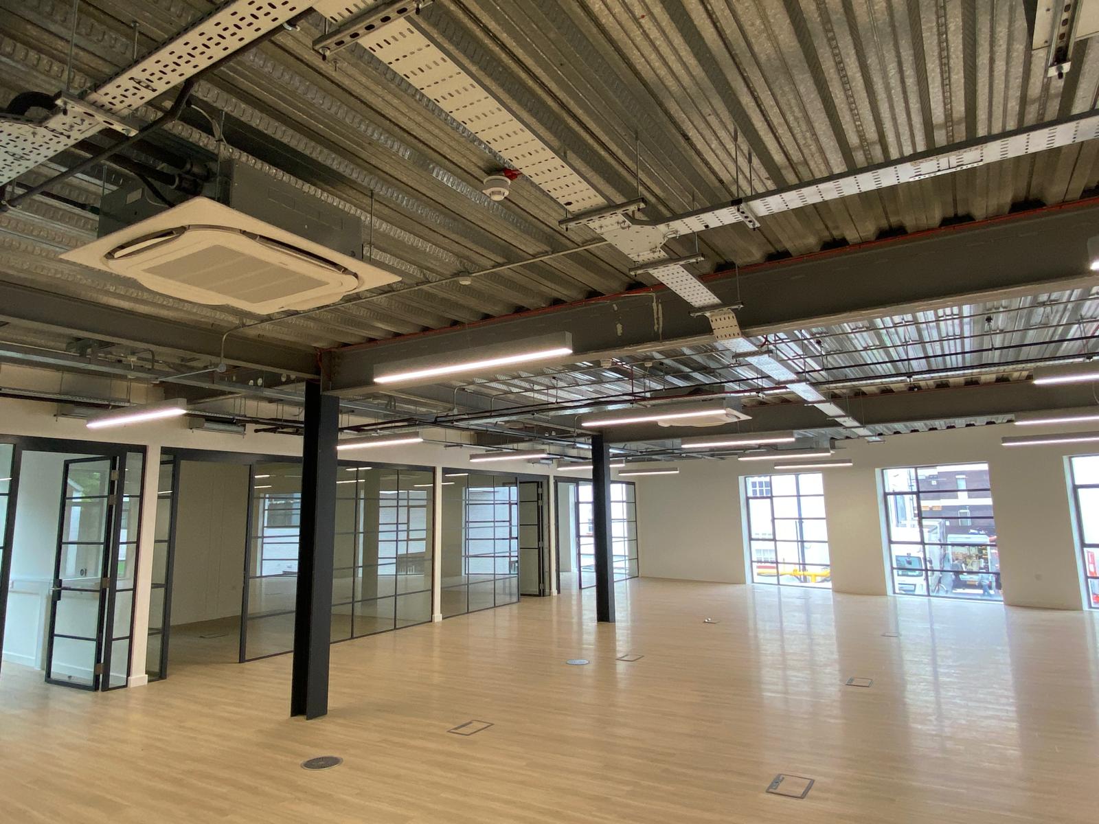 Ceiling cassette air conditioning in an open-plan office at Ealing Studios
